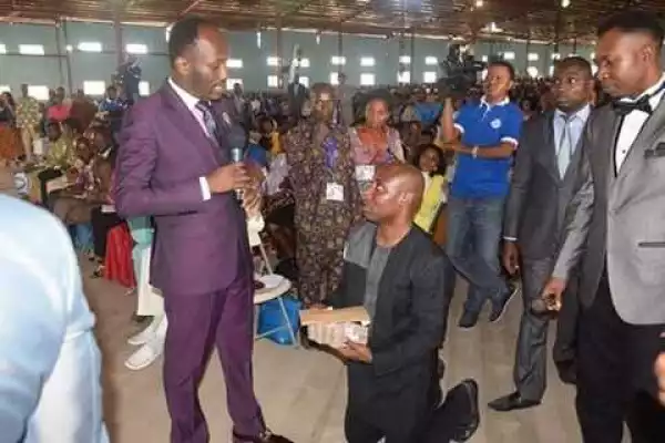 Heart of Gold? Popular Nigerian Pastor Blesses Church Member withMulti-million SUV, Raw Cash (Photos)